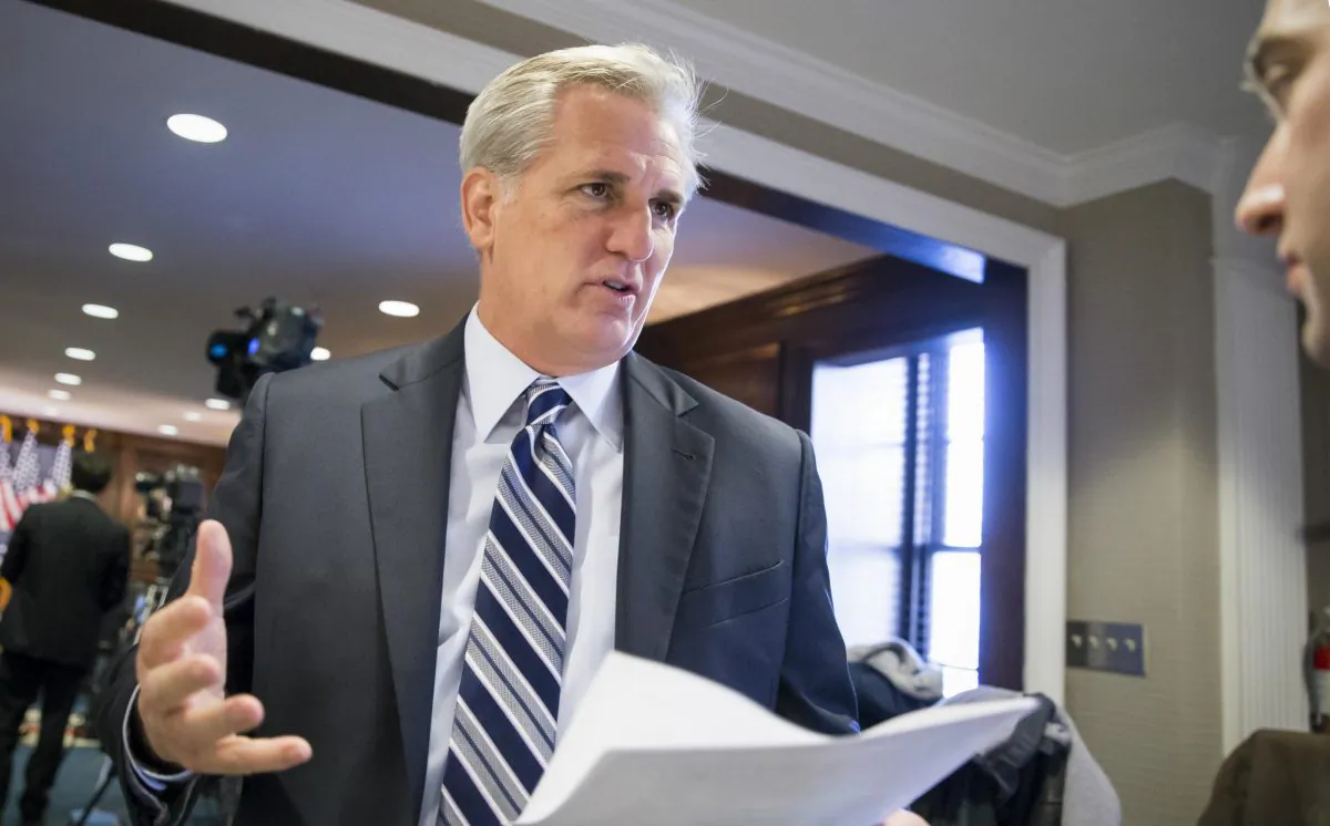Majority Leader Kevin McCarthy (R-Calif.) speaks with a reporter following a closed-door GOP caucus meeting at the Republican National Headquarters on Capitol Hill in Washington, D.C., Tuesday, Dec. 8, 2015. Invoking the Paris terror attacks, House lawmakers pushed toward a vote Tuesday on legislation tightening controls on travel to the U.S. and requiring visas for anyone who's been in Iraq or Syria in the previous five years. "You have more than 5,000 individuals that have Western passports in this program that have gone to Iraq or Syria in the last five years," said McCarthy. "Those are gaps that we need to fix." (AP Photo/J. Scott Applewhite)