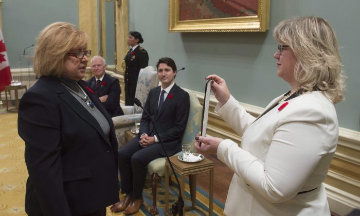 Labour Minister MaryAnn Mihychuk is sworn in at Rideau Hall on Nov.4, 2015, in Ottawa. Mihychuk is overhauling the EI system and labour code to address a growing gap between current regulations and disruptive new business models. (THE CANADIAN PRESS/Adrian Wyld)