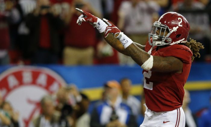 Running back Derrick Henry of the Alabama Crimson Tide set an SEC record with 1,986 rushing yards this season. (Kevin C. Cox/Getty Images)