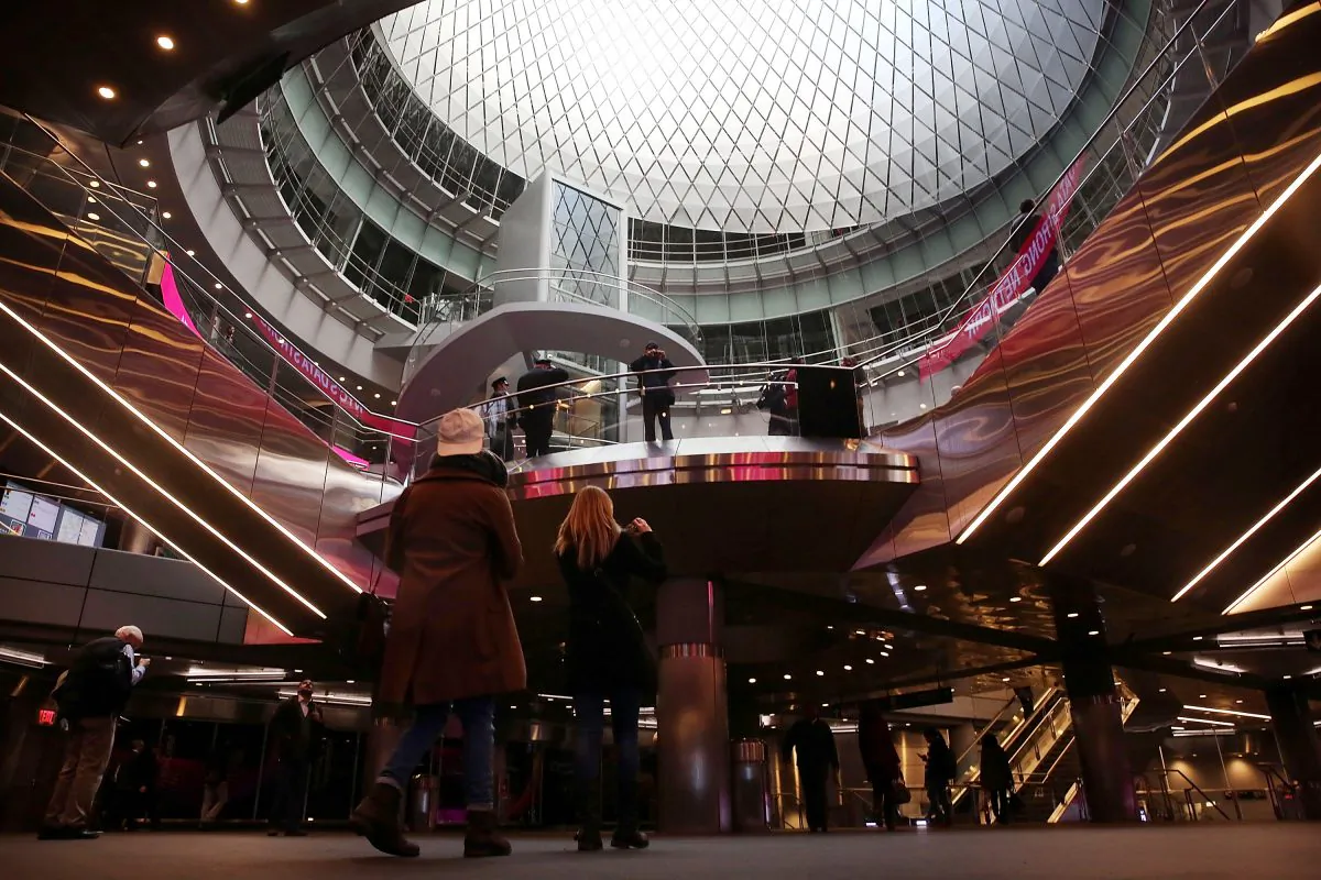 Commuters walk through the newly opened Fulton Center train station in lower Manhattan on November 10, 2014 (Spencer Platt/Getty Images)