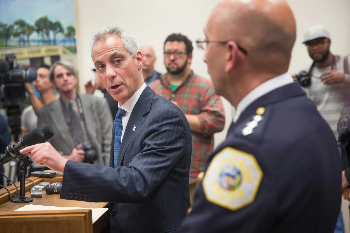 Interim Chicago Police Superintendant John Escalante (R) listens as Mayor Rahm Emanuel takes questions during a press conference in Chicago, Ill., on Dec. 7, 2015. (Scott Olson/Getty Images)