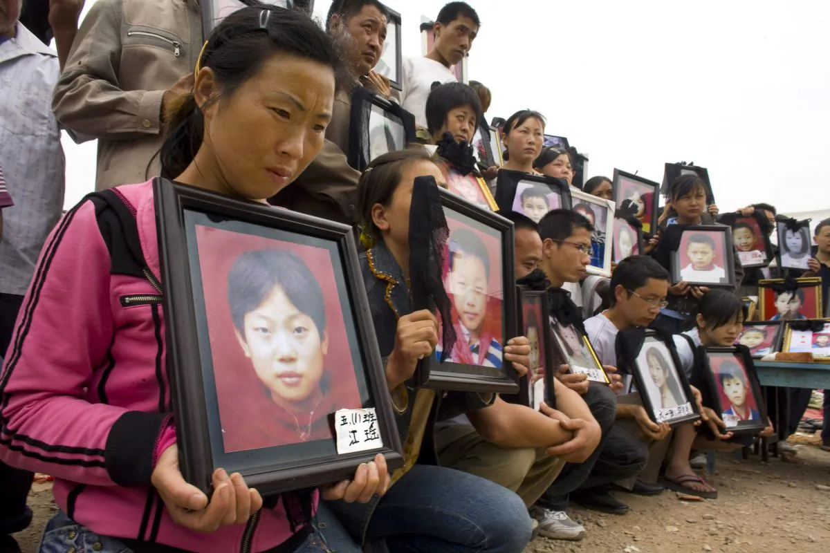 Parents mourn their children, who died at Fuxin Primary School on May 22, 2008, in Wufu, Sichuan Province, China, on May 22, 2015. (Paula Bronstein/Getty Images)