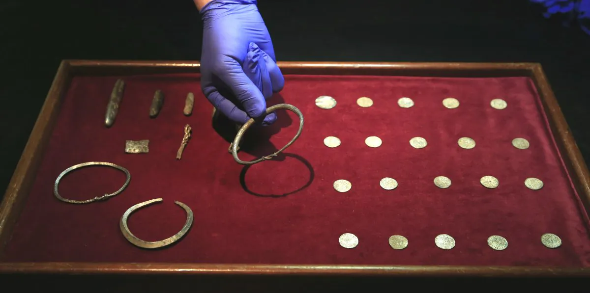 A close up of some of the jewellery and ingots of a significant Viking Hoard found near Watlington, in Oxfordshire, England as they are displayed at the British Museum in London, Thursday, Dec. 10, 2015. (AP Photo/Alastair Grant)