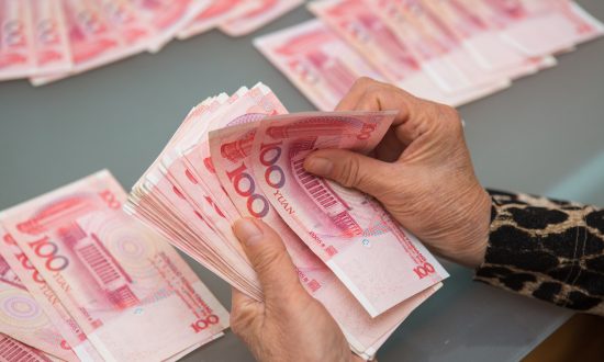 China’s Yuan Sinks to 10-Year Low Against Dollar