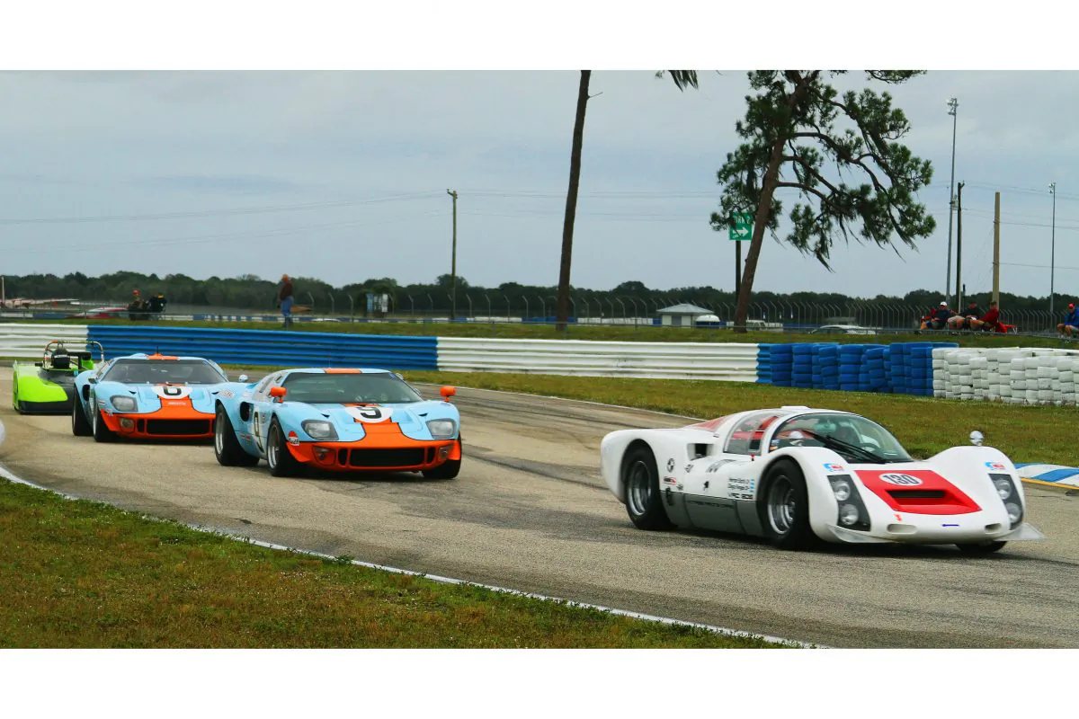 Diego Fangio and Hernan Staffa’s 1966 VRC Porsche 906 leads Jeff McKee’s 1966 SPF GT40, Harry McPherson’s 1969/2009 SPF GT40, and John Boxhorn’s 1984 2-liter Tiga SC84 at the 2015 HSR Sebring season finalé. (Chris Jasurek/Epoch Times)