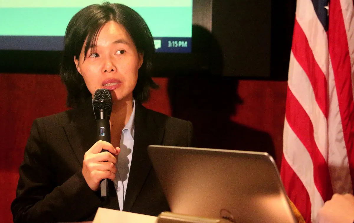 Dr. Zhang Yuwei speaks at a forum, Dec. 10, on Capitol Hill on the persecution of Falun Gong. She was severely tortured physically and mentally at a local brainwashing center and thought she was going to die. (Gary Feuerberg/Epoch Times)
