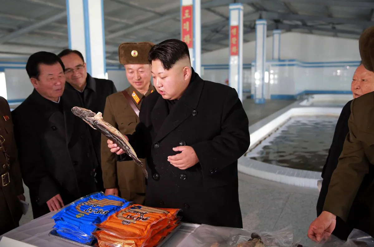 North Korean leader Kim Jong-Un inspects a catfish farm renovated on May 9 in an undated photo released by North Korea's official Korean Central News Agency on Dec. 12. North Korea has launched a campaign to arrest Chinese nationals suspected of spying and other crimes. (KNS/AFP/Getty Images)
