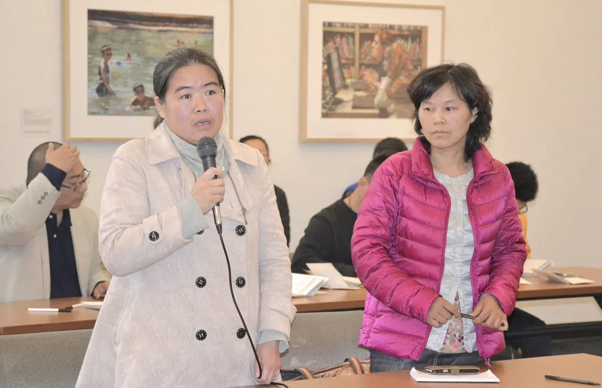 (L-R) Gao Shen and He Juan attend a human rights event in San Francisco, California on Dec. 14, 2015. (Liang Bo/Epoch Times)
