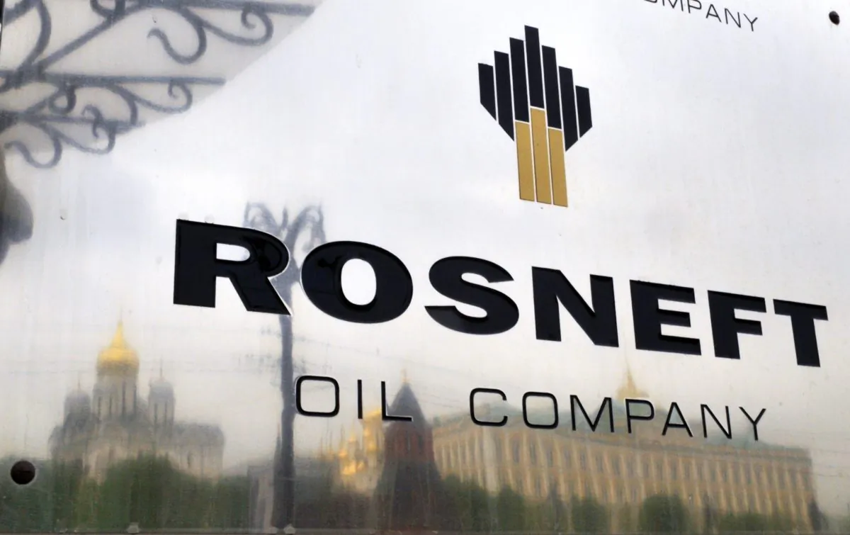 The Kremlin is reflected in a polished plate of the state-controlled Russian oil giant Rosneft at the entrance of its headquarters in Moscow, on May 17, 2011. (Dmitry Kostyukov/AFP/Getty Images)