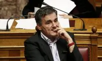 Greece Approves New Austerity Bill Changing Loan Rules