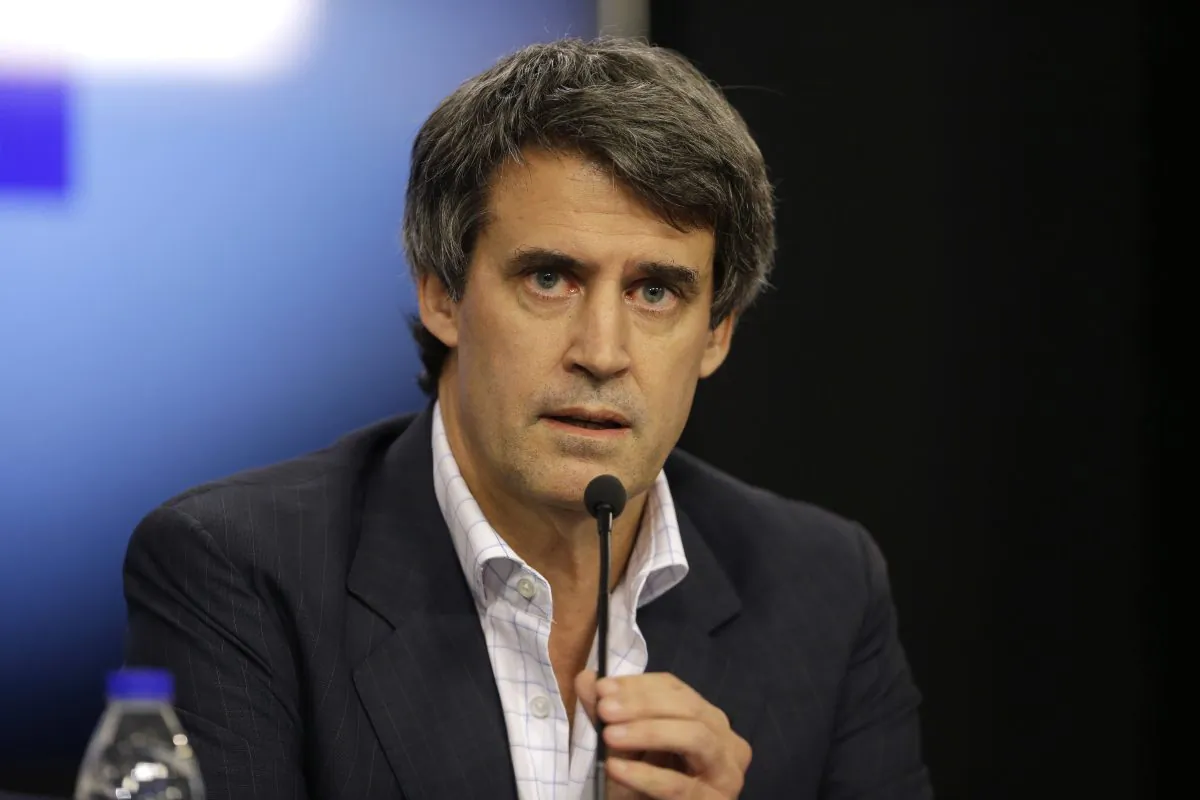 Argentina's Finance Minister Alfonso Prat-Gay in Buenos Aires, Argentina, on Dec. 16, 2015. The Argentine government has announced plans to lift deeply unpopular restrictions on buying U.S. dollars that have created a booming black market in the South American nation. (AP Photo/Victor R. Caivano)