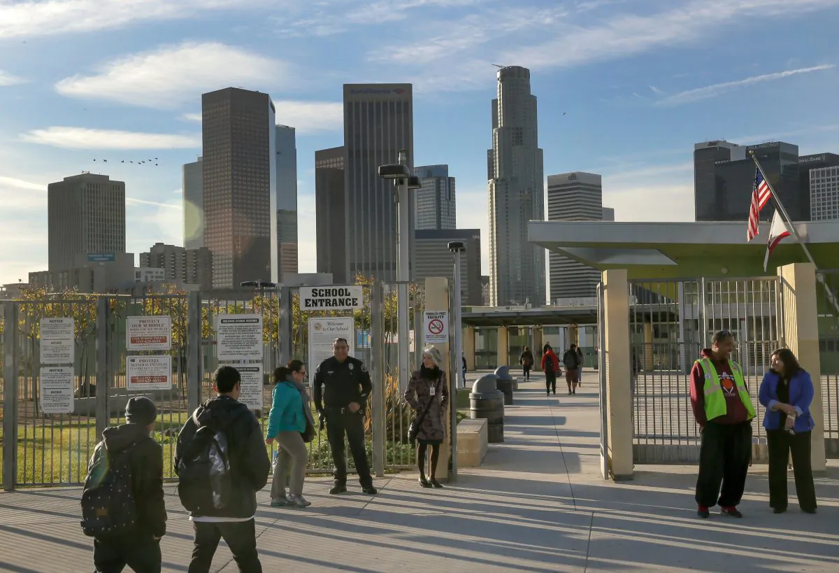 Los Angeles-area students head back to school at the Edward R. Roybal Learning Center in Los Angeles on Dec. 16, 2015. (AP Photo/Damian Dovarganes)