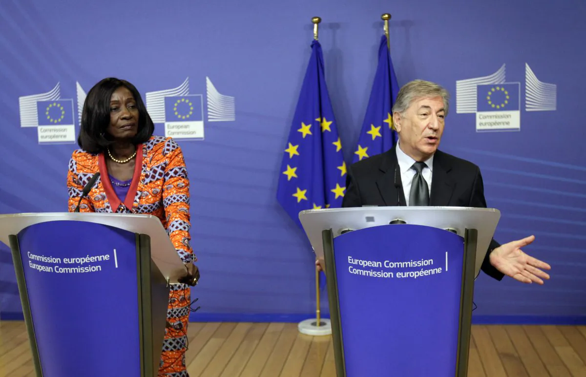 European Union Commissioner for Fisheries Karmenu Vella (R) and Ghana's Minister of Fisheries Sherry Ayittey participate in a media conference at EU headquarters in Brussels on Friday, Dec. 18, 2015. (AP Photo/Francois Walschaerts)