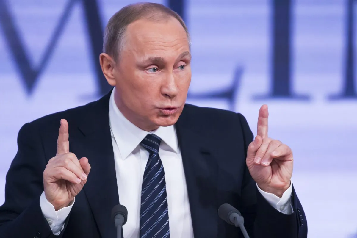 Russian President Vladimir Putin gestures during the annual end of year news conference in Moscow, Russia, Thursday, Dec. 17, 2015. (AP Photo/Alexander Zemlianichenko)