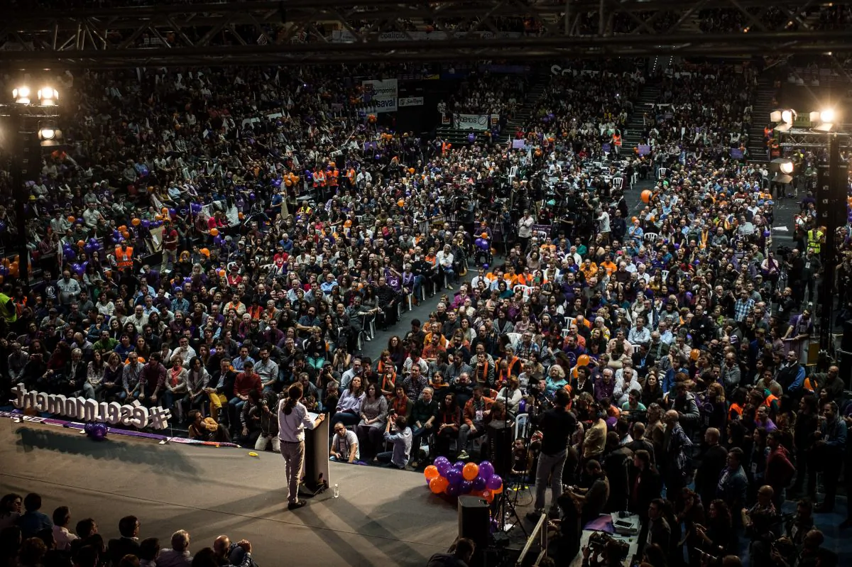Podemos (We Can) leader Pablo Iglesias delivers his speech during the closing campaign rally in Valencia, Spain, on Dec. 18, 2015. Over 36 million Spaniards will flock to the polls on Sunday, Dec. 20, 2015, to vote for 350 members of the parliament and 208 senators. For the first time since 1982, the two traditional Spanish political parties, right-wing Partido Popular (People's Party) and center-left wing Partido Socialista Obrero Espanol PSOE (Spanish Socialist Workers' Party), are holding a tight election race with two new contenders, Ciudadanos (Citizens) and Podemos (We Can) attracting right-leaning and left-leaning voters respectively. (David Ramos/Getty Images)