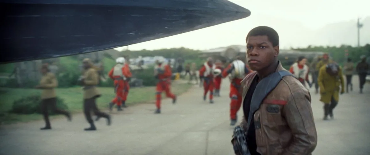 John Boyega as Finn in a scene from the new film "Star Wars: The Force Awakens," directed by J.J. Abrams. The movie was released in the U.S. on Friday, Dec. 18, 2015. (Film Frame/Disney/Lucasfilm via AP)