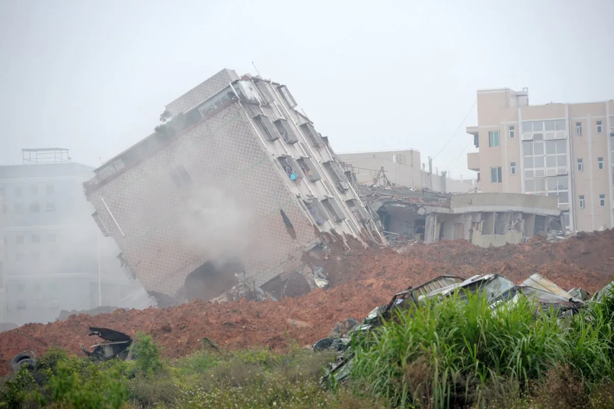 A building tilts dangerously after a landslide hit an industrial park in Shenzhen, south China's Guangdong province on Dec. 20, 2015. (STR/AFP/Getty Images)