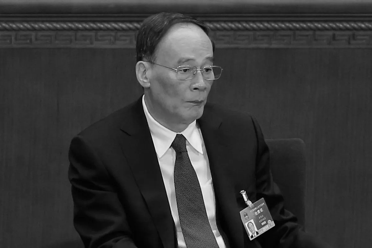 Secretary of the Central Commission for Discipline Inspection Wang Qishan attends the opening of the 3rd Session of the 12th National People's Congress at the Great Hall of the People in Beijing, China, on March 5, 2015. (Lintao Zhang/Getty Images)