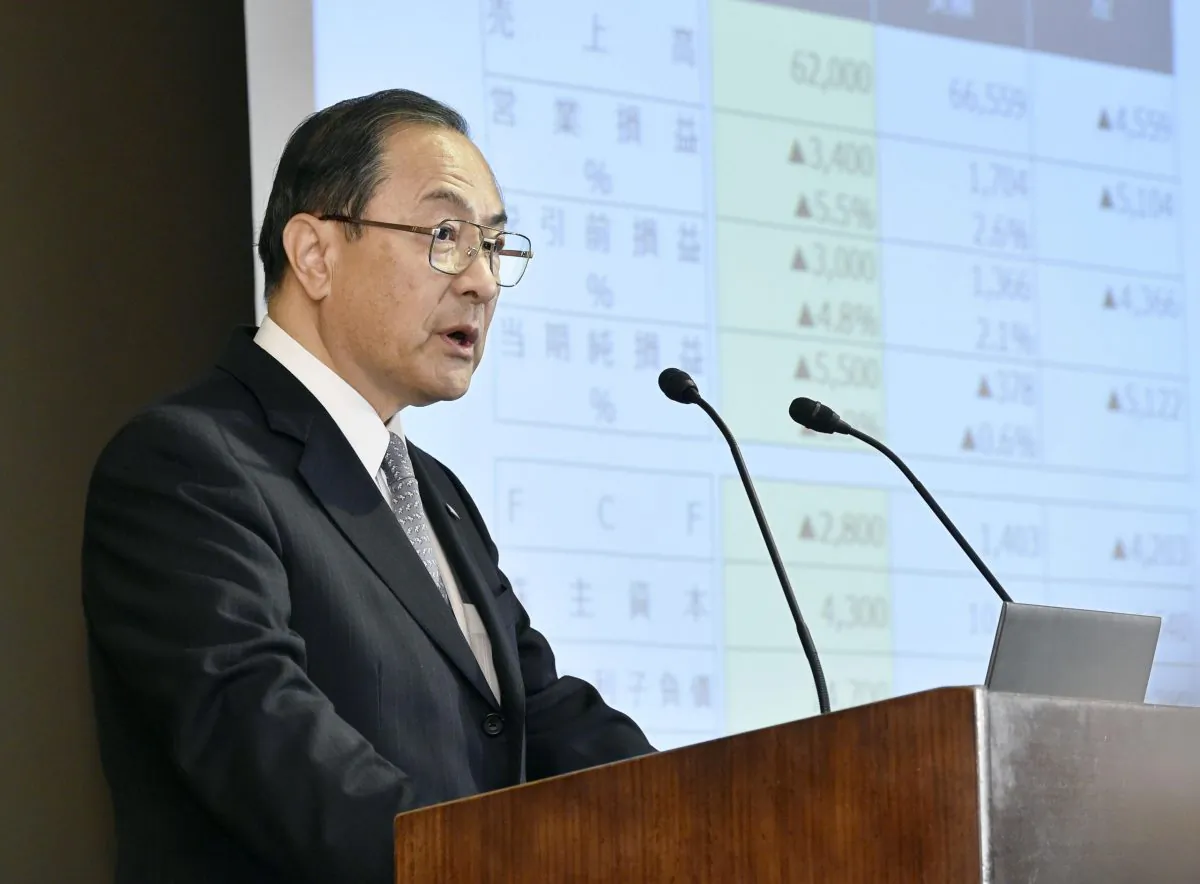 Toshiba Corp. President Masashi Muromachi at a press conference at the company's headquarters in Tokyo on Dec. 21, 2015. Scandal-plagued Japanese manufacturer Toshiba is cutting 7,800 jobs after projecting a net loss of 550 billion yen ($4.5 billion) for the fiscal year through March 2016. Toshiba said Monday it will slash the jobs in its personal computer, video product and consumer electronic businesses. (Shigeyuki Inakuma/Kyodo News via AP)
