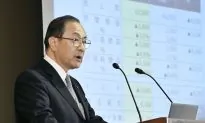 Toshiba to Cut 7,800 Jobs Amid Record Loss