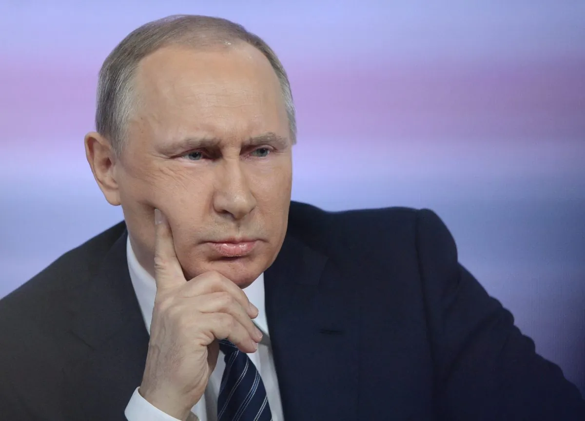 Russian President Vladimir Putin holds his annual press conference in Moscow on Dec. 17, 2015. Putin said on Dec. 17 Russia was prepared to face any economic situation as the country's energy-dependent economy reels from lower oil prices. (Natalia Kolesnikova/AFP/Getty Images)