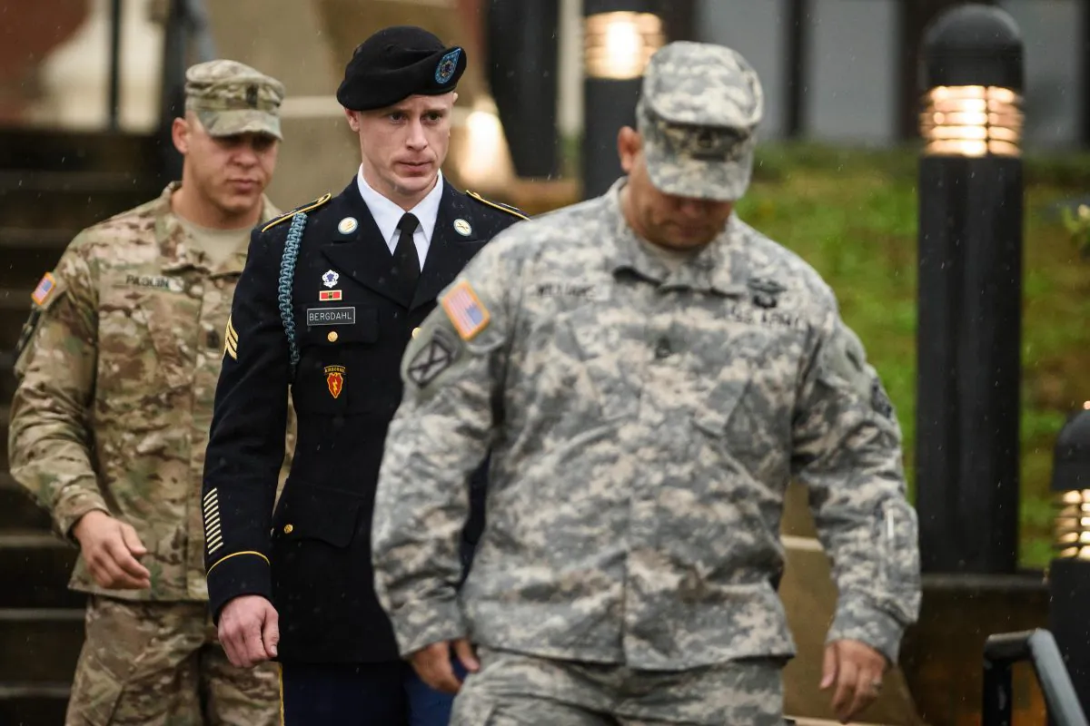 U.S. Army Sgt. Bowe Bergdahl leaves the courthouse Tuesday, Dec. 22, 2015, after his arraignment hearing at Fort Bragg, N.C. Bergdahl, who disappeared in Afghanistan in 2009 and was held by the Taliban for five years, was scheduled to appear Tuesday before a military judge on charges of desertion and misbehavior before the enemy. (Andrew Craft/The Fayetteville Observer via AP)