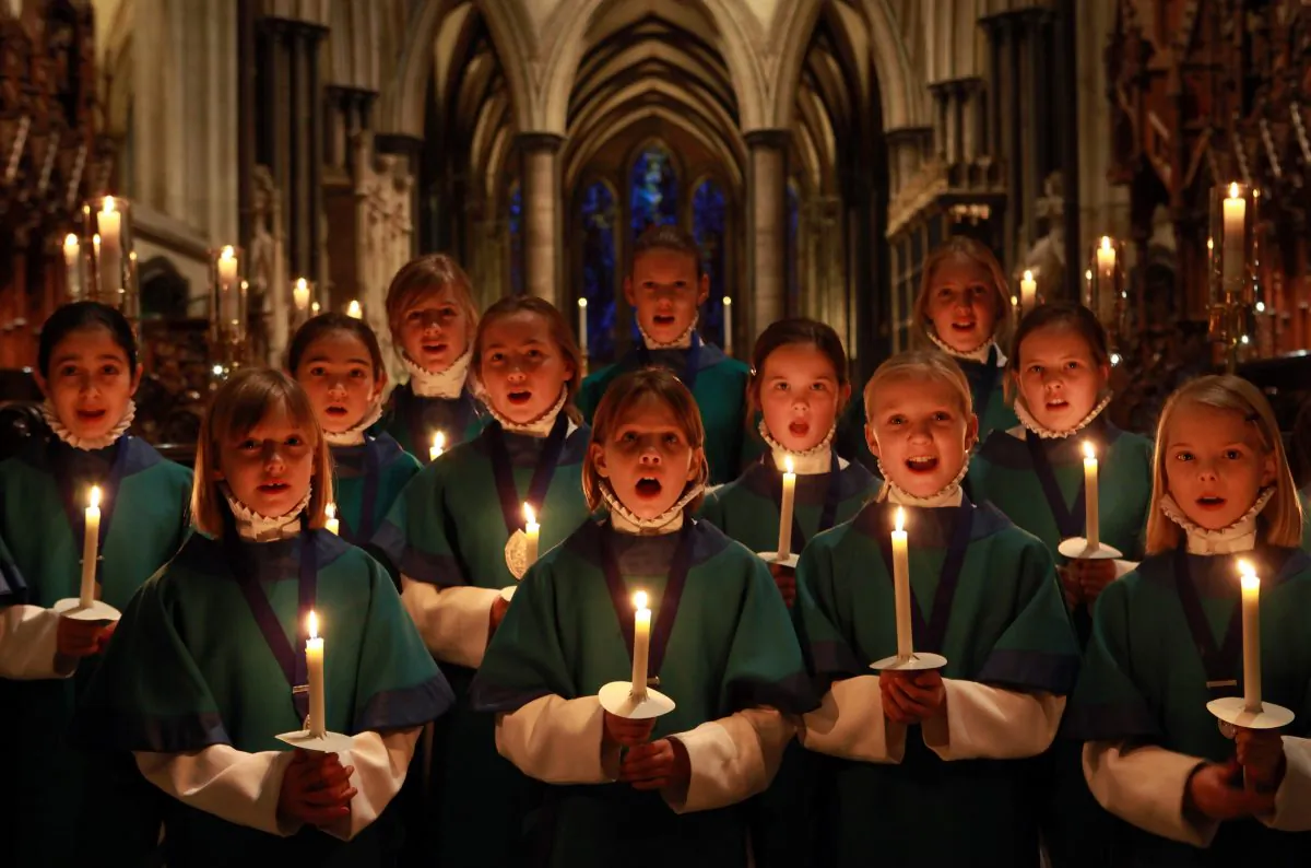 Choristers from the Salisbury Cathedral Choir practice ahead of the services held in the Cathedral marking Christmas Eve in Salisbury, England, on Dec. 23, 2009. Christmas has been celebrated in the cathedral for over 750 years since it was dedicated in 1258. It is thought that the foundation of the choir stretches back even further, with evidence of a song school in Salisbury as early as the 11th century. (Matt Cardy/Getty Images)