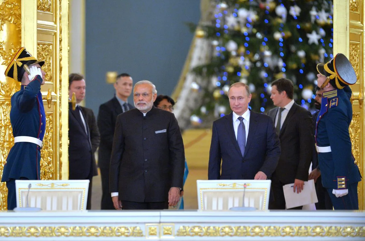 Russian President Vladimir Putin and Indian Prime Minister Narendra Modi arrive to attend a meeting with Russian and Indian officials and businessmen in the Kremlin in Moscow, on Dec. 24, 2015. (Alexei Druzhinin, Sputnik,  Kremlin Pool Photo via AP/Getty Images)