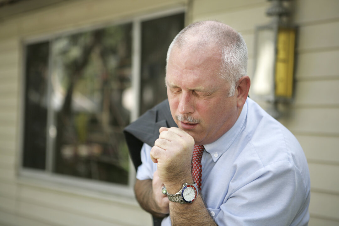 Coughing helps expel toxins for people with COPD. (lisafx/iStock)
