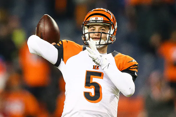 Quarterback AJ McCarron #5 of the Cincinnati Bengals throws as he warms up before a game against the Denver Broncos at Sports Authority Field at Mile High in Denver, Colo, on Dec. 28, 2015. (Justin Edmonds/Getty Images)
