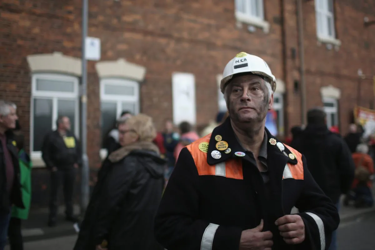 Miners, union members, and the local community take part in a protest march from Knottingley Town Hall to the Miners Welfare Center marking the end of deep coal mining in Britain, in Knottingley, England, on Dec. 19, 2015. Kellingley Colliery closed Dec. 18. The last deep mine in Britain began production in 1965. Its closure will complete a carefully managed two-year plan for the U.K.s deep mines. This has been implemented by U.K. Coal with financial support from the British government. It follows a long period of difficult trading conditions largely due to low international coal prices. (Christopher Furlong/Getty Images)