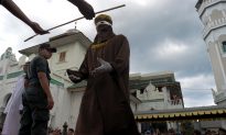 Woman Collapses in Agony as She and a Man Are Caned Under Sharia Law in Indonesia for Being ‘Seen in Close Proximity’
