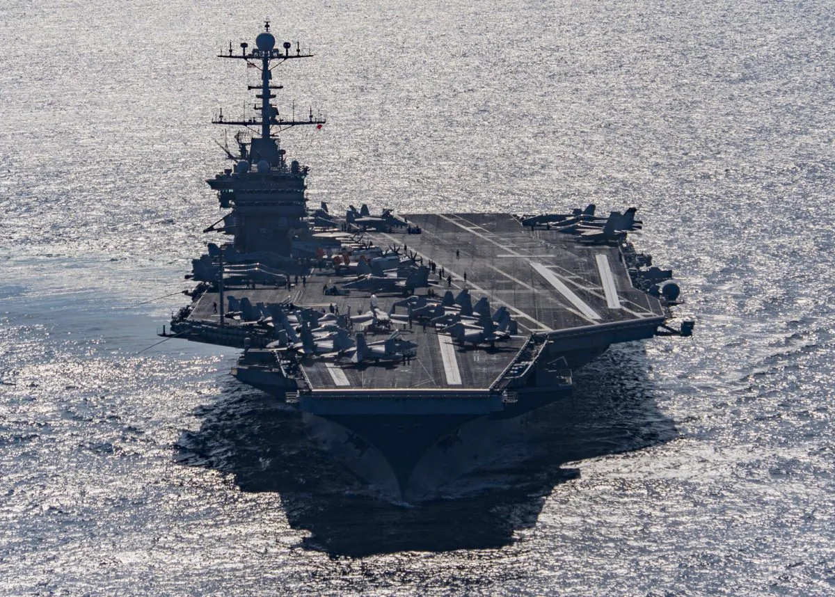 The aircraft carrier USS Harry S. Truman navigates the Gulf of Oman on Dec. 25, 2015. Iranian naval vessels conducted rocket tests last week near the USS Harry S. Truman aircraft carrier, the USS Bulkeley destroyer and a French frigate, the FS Provence, and commercial traffic passing through the Strait of Hormuz, the American military said Wednesday, Dec. 30, 2015, causing new tension between the two nations after a landmark nuclear deal. (Mass Communication Specialist 3rd Class J.M. Tolbert/U.S. Navy via AP)
