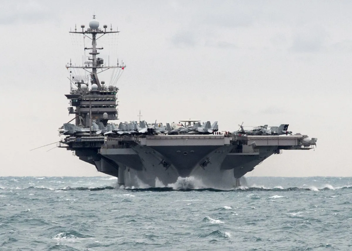 The aircraft carrier USS Harry S. Truman transits the Strait of Hormuz on Dec. 26, 2015. (Mass Communication Specialist 2nd Class M. J. Lieberknecht/U.S. Navy via AP)