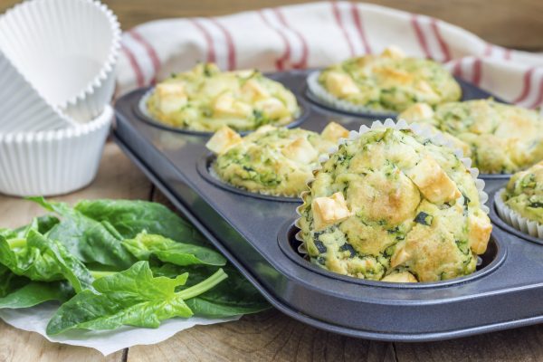 Freshly baked egg muffins with spinach and feta cheese (iuliia_n/iStock)