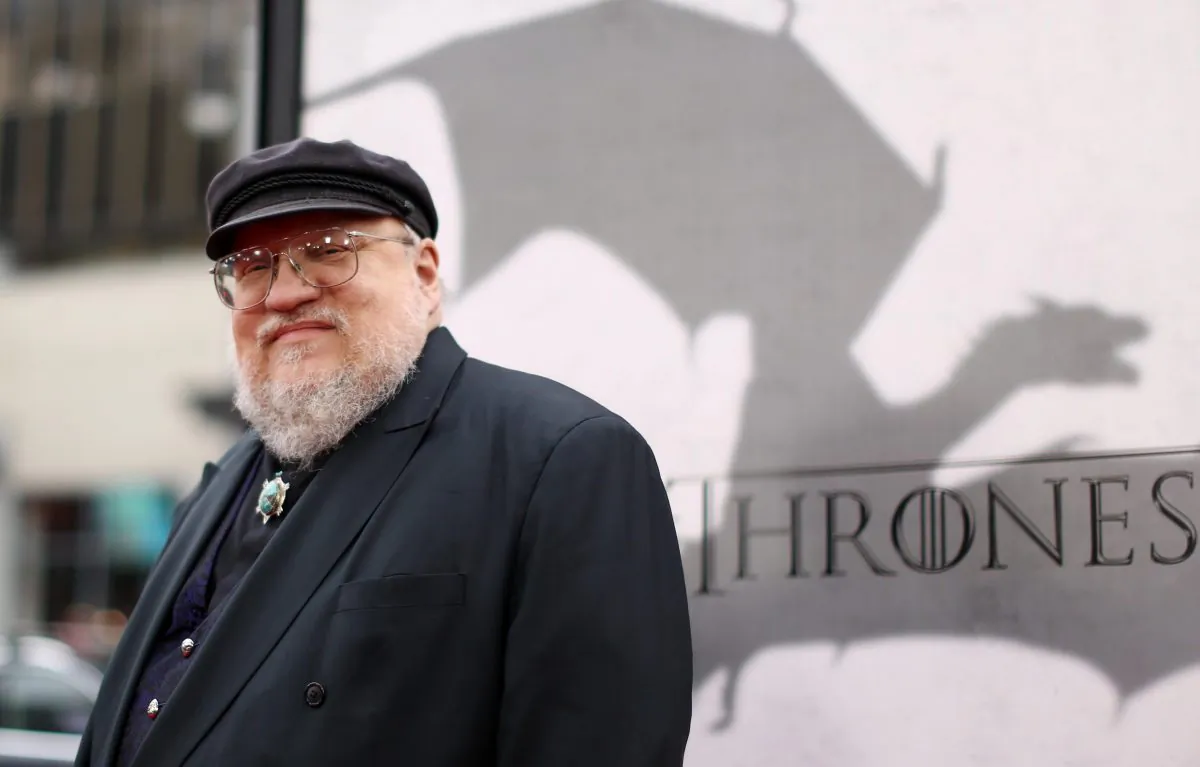 Author George R.R. Martin arrives at the premiere for the third season of the HBO television series "Game of Thrones" at the TCL Chinese Theatre in Los Angeles on March 18, 2013. (Matt Sayles/Invision/AP)