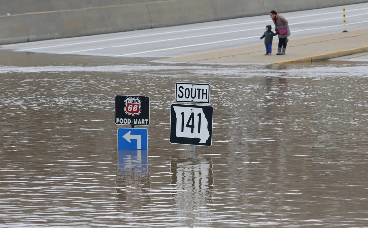 Floodwater from the Meramec River in St. Louis County, Miss., on Dec. 30, 2015. (J.B. Forbes/St. Louis Post-Dispatch via AP)