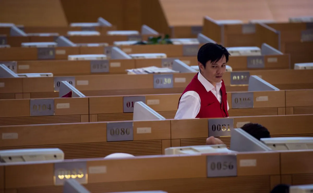 A man works on the trading floor at the Shanghai Stock Exchange on September 22, 2015. (JOHANNES EISELE/AFP/Getty Images)