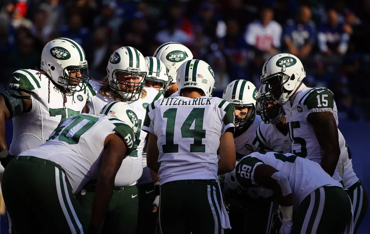 Ryan Fitzpatrick (C) and the New York Jets won 10 games this season but failed to make the postseason for the fifth time in a row. (Al Bello/Getty Images) 