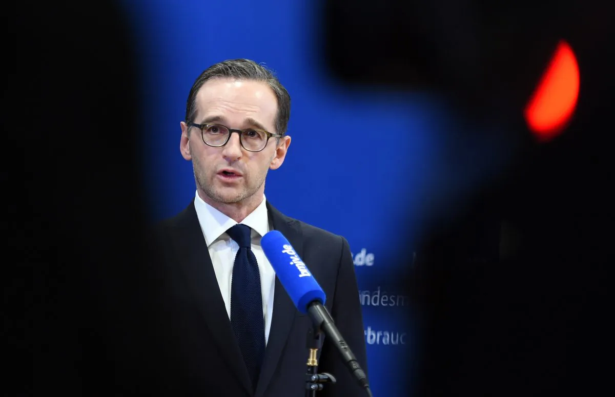 German Justice Minister Heiko Maas delivers remarks on the assaults in Cologne, Germany, on New Year's Eve, in Berlin, Germany, on Jan. 5, 2016. Heiko Maas called for the perpetrators to be held to account, saying the attacks were "cowardly and vile." Officials in Cologne are holding crisis meeting following a series of sex assaults in the western German city on New Year's Eve. Mayor Henriette Reker called Tuesday's meeting to discuss the police response to the assaults that occurred around Cologne's main train station during the night. (Britta Pedersen/dpa via AP)