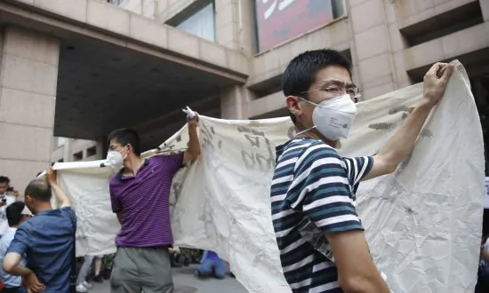 Four Months After Tianjin Blast, Victims Seek Relief
