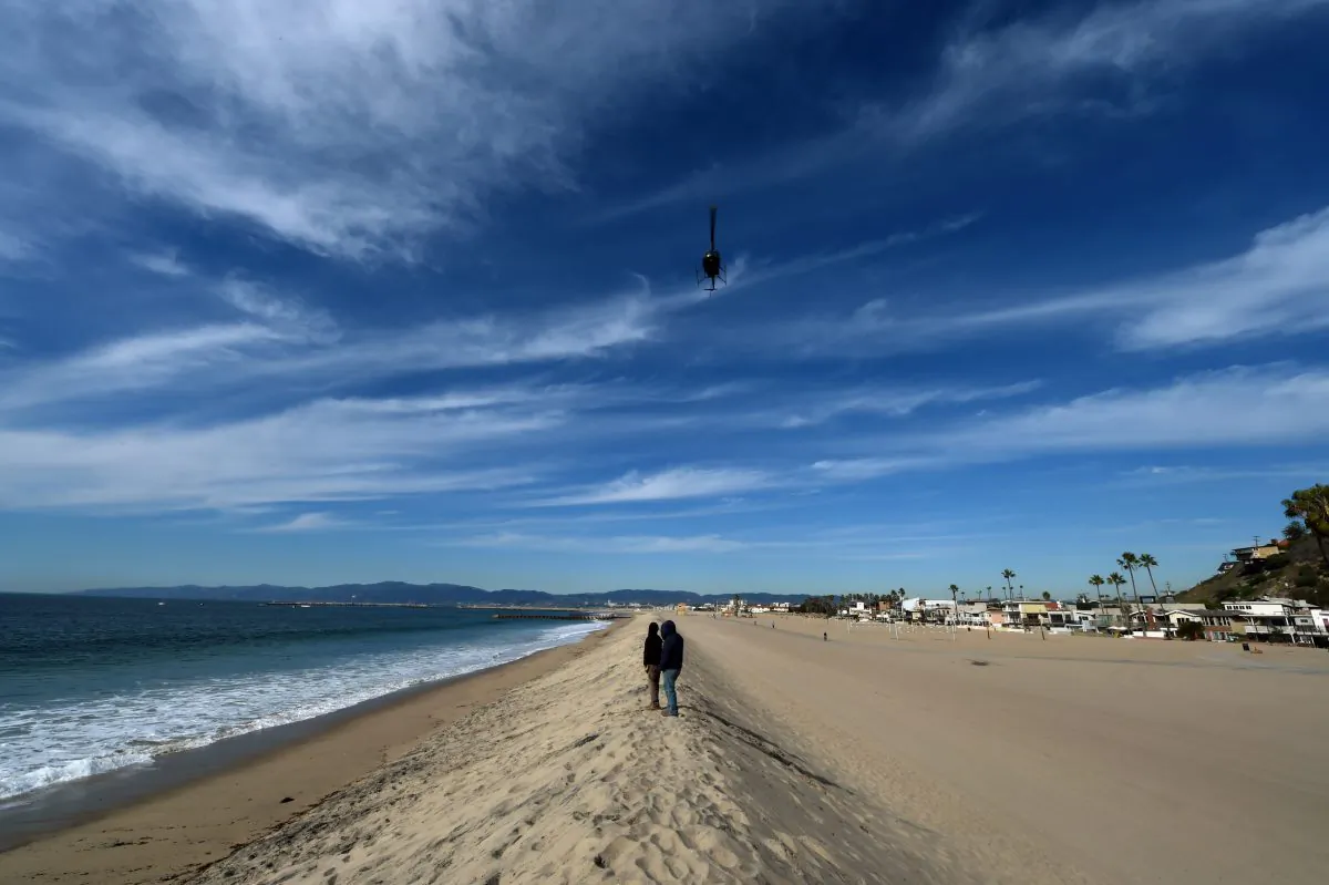 A sand berm created by city workers to protect houses from El Nino storms and high tides is seen at Playa Del Rey beach in Los Angeles, California on November 30, 2015 at the start of the COP21 conference in Paris. (MARK RALSTON/AFP/Getty Images)