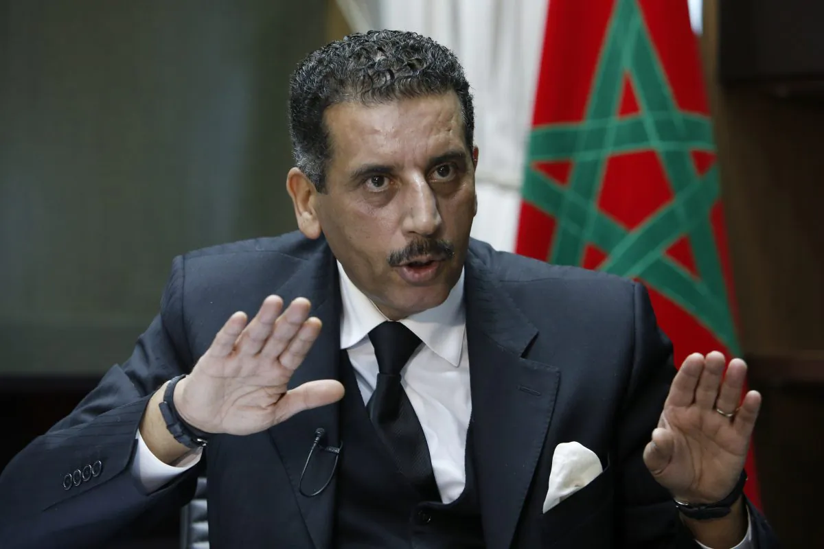 The director of the Central Bureau of Judicial Investigations, Abdelhak Khiame, gestures during an interview with The Associated Press at his headquarters in Sale near Rabat, Morocco, on Jan. 5, 2016. Khiame says it was his country that put French and Belgian police on the trail of the network behind the Paris attacks that killed 130, and likely spared more lives by pinpointing the location of the man considered the main organizer, holed up outside the French capital. (AP Photo/Abdeljalil Bounhar)