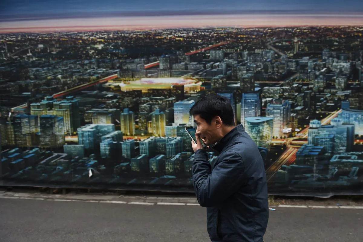 A man on a street in Beijing on Nov. 12, 2015. (Greg Baker/AFP/Getty Images)