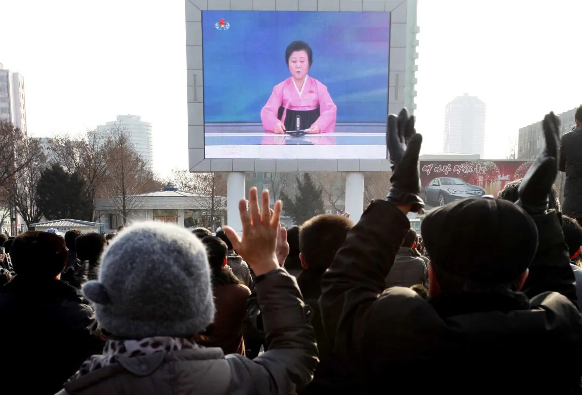 North Koreans watch a news broadcast on a video screen outside Pyongyang Railway Station in Pyongyang, North Korea, on Jan. 6, 2016. Pyongyang has long claimed it has the right to develop nuclear weapons to defend itself against the U.S., an established nuclear power with whom it has been in a state of war for more than 65 years. But to build a credible nuclear threat, the North must explode new nuclear devices—including miniaturized ones—so its scientists can improve their designs and technology. (AP Photo/Kim Kwang Hyon)