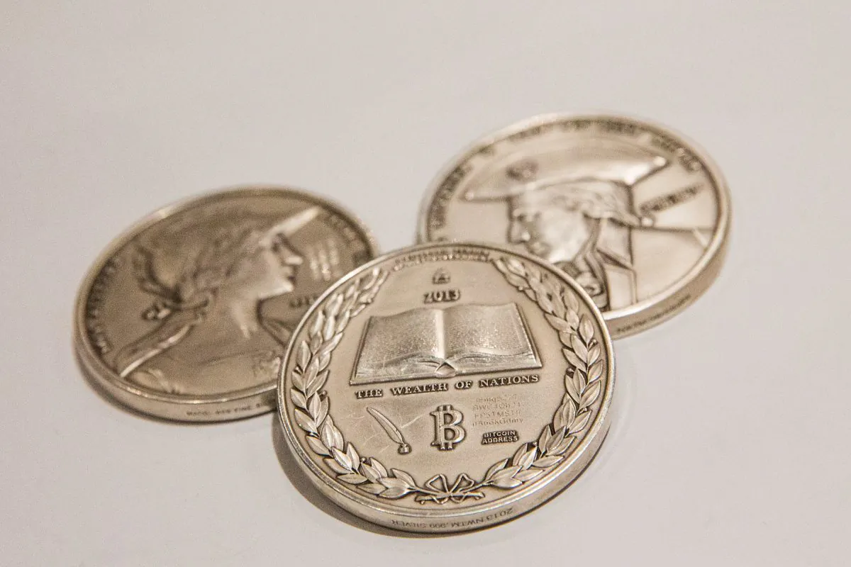Silver coins with the Bitcoin logo on them are displayed at a Bitcoin conference on at the Javits Center April 7, 2014 in New York City. (Andrew Burton/Getty Images)