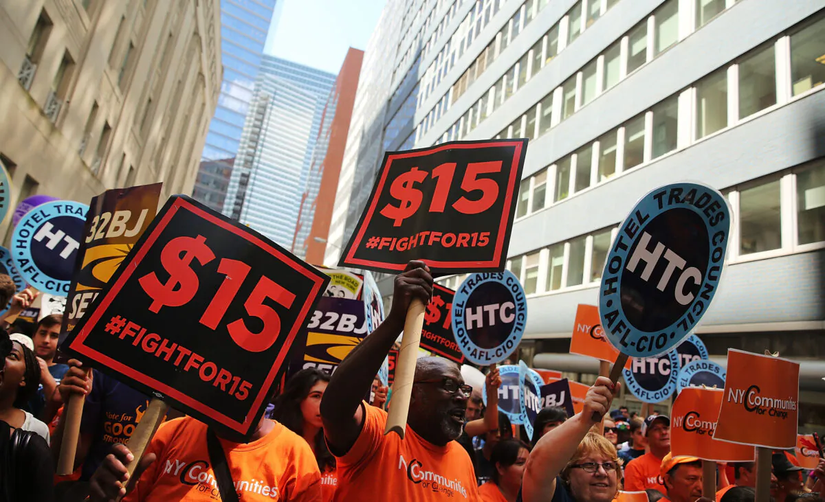 Labor leaders, workers, and activists attend a rally for a $15 minimum hourly wage in New York City on July 22, 2015. (Spencer Platt/Getty Images)