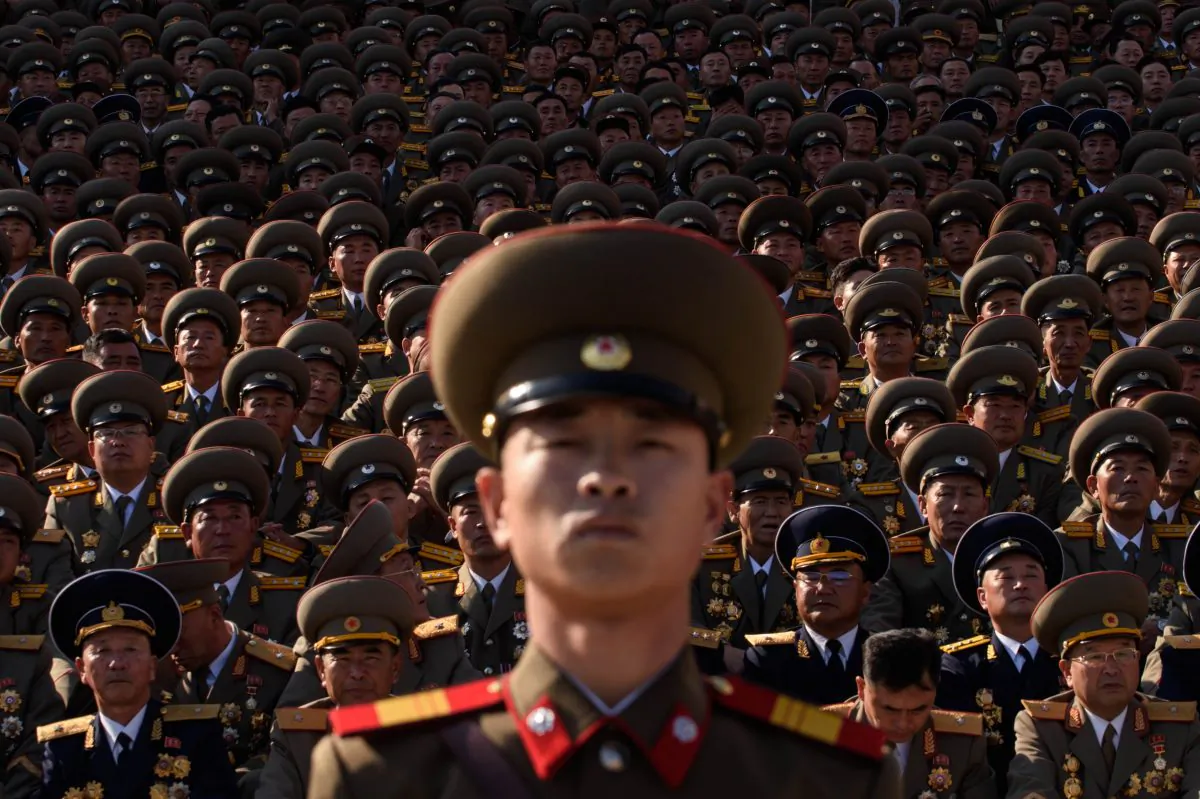 A North Korean soldiers stands before spectators during a mass military parade at Kim Il-sung square in Pyongyang on Oct. 10, 2015. North Korea was marking the 70th anniversary of its ruling Workers' Party. (Ed Jones/AFP/Getty Images)