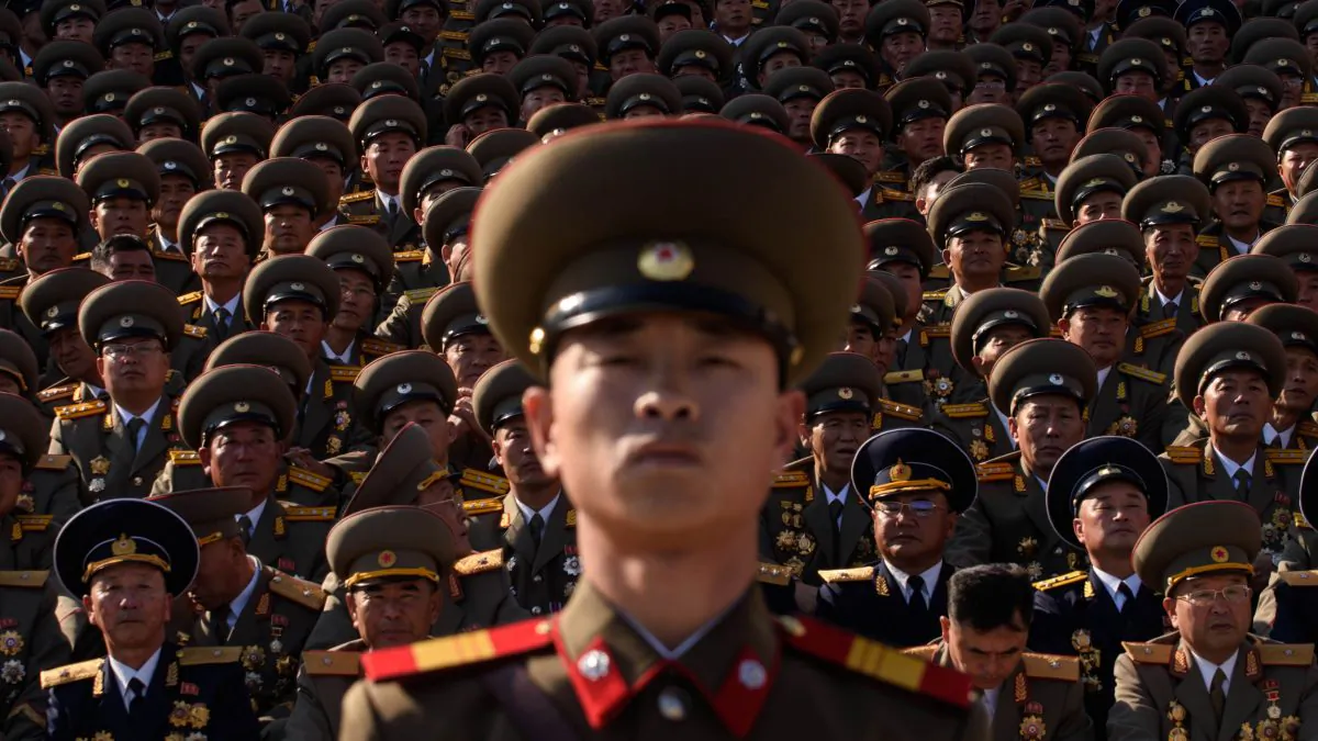 A North Korean soldiers stands before spectators during a mass military parade at Kim Il-Sung square in Pyongyang on Oct. 10, 2015. (Ed Jones/AFP/Getty Images)