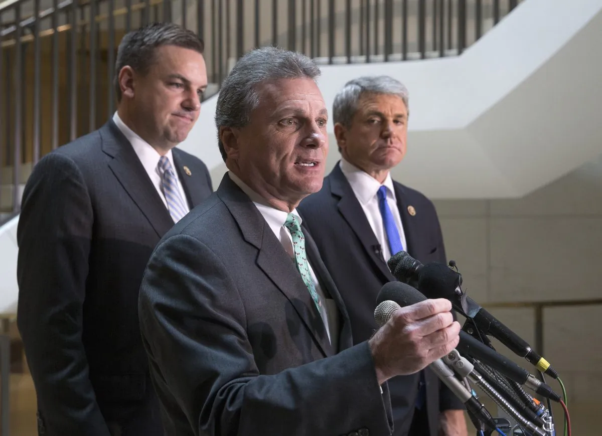 Rep. Buddy Carter (R-Ga.) (C), flanked by House Homeland Security Committee Chairman Rep. Michael McCaul (R-Texas) (R) and Rep. Richard Hudson (R-N.C.), speaks with reporters on Capitol Hill in Washington, D.C., on Jan. 8, 2016, about the arrest of two Iraqi-born men who came to the U.S. as refugees and have been indicted on terrorism-related charges by federal authorities who allege one traveled to Syria to fight with terrorists in the civil war and the other provided support to the Islamic State group. (AP Photo/J. Scott Applewhite)